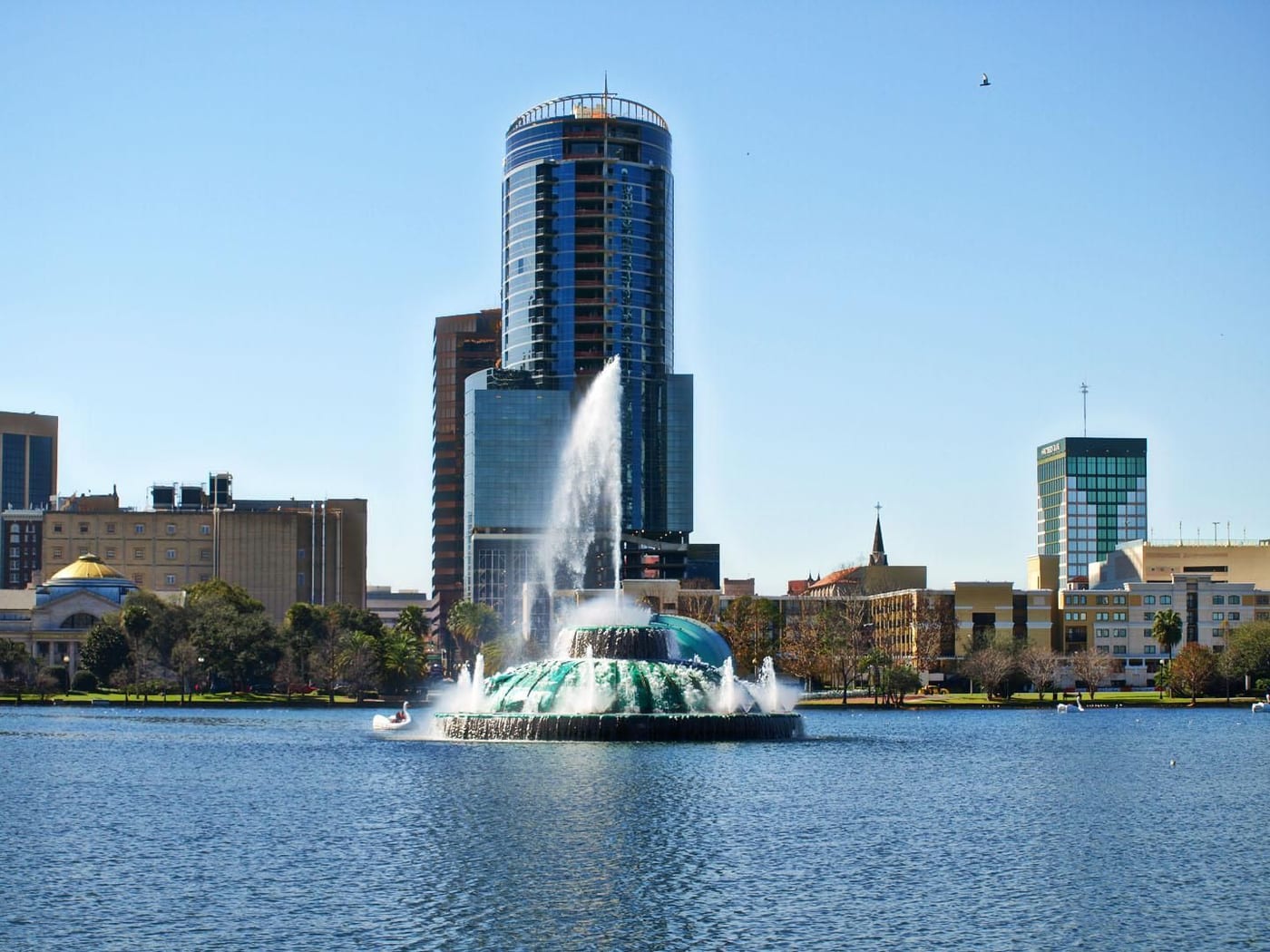 Lake Eola fountain and Orlando skyline from the park shoreline